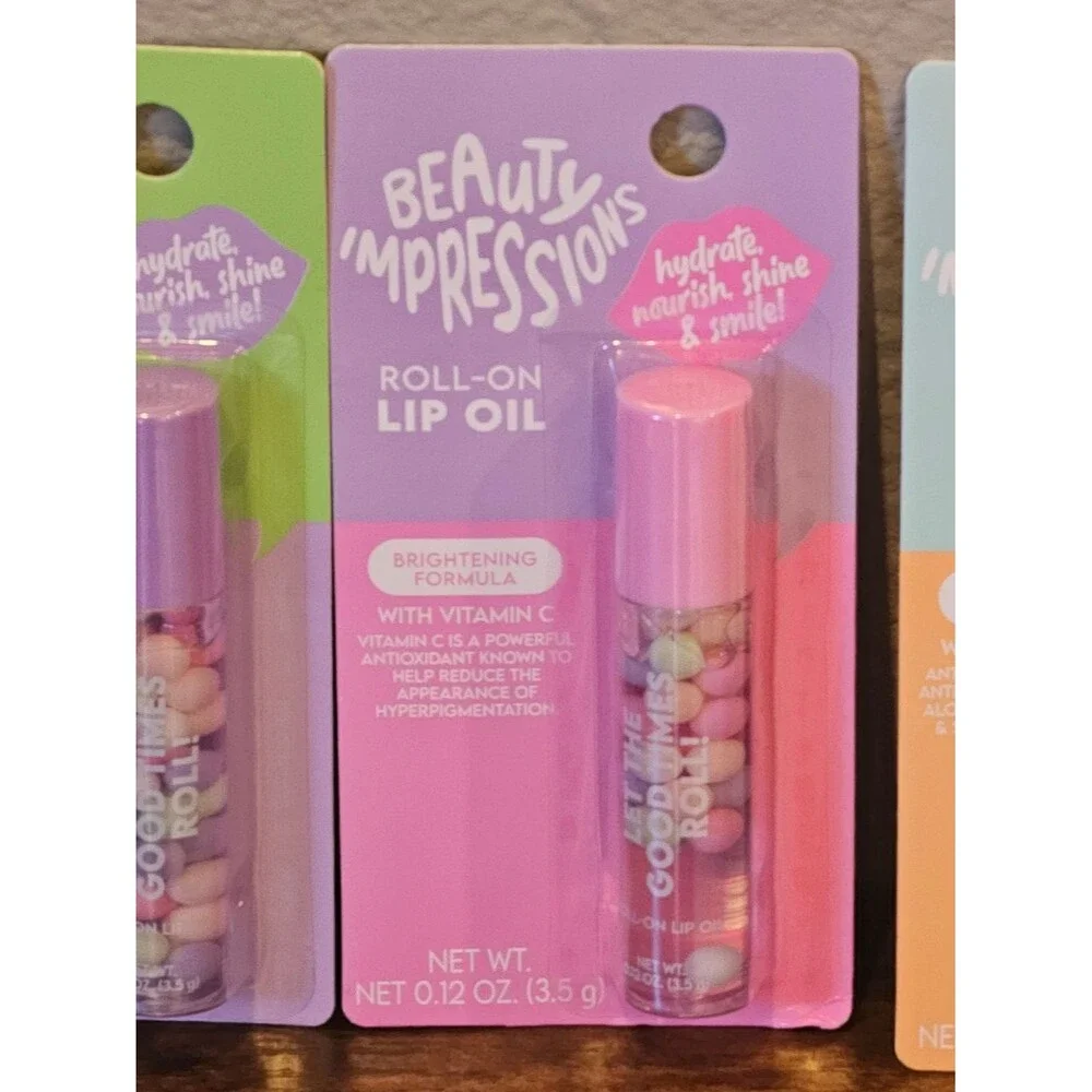 NWT Beauty Impressions Roll-On Lip Oil Bundle